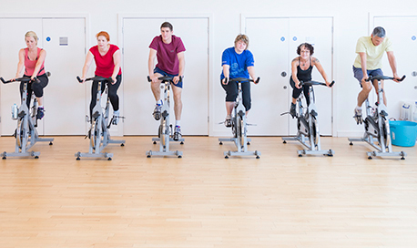 A busy spin class in session in the ֱ sports centre